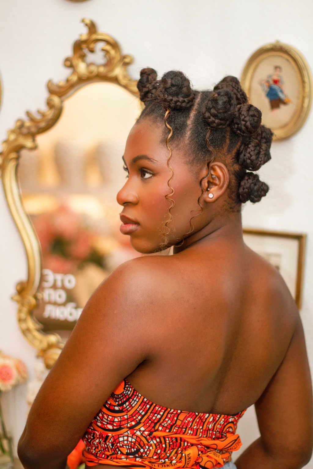 Afora with a braided updo